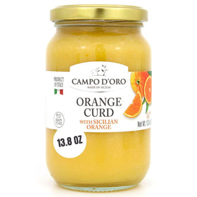 CAMPO D'ORO Sicilian Orange Curd jar close-up showing velvety texture ideal for spreading on toast.