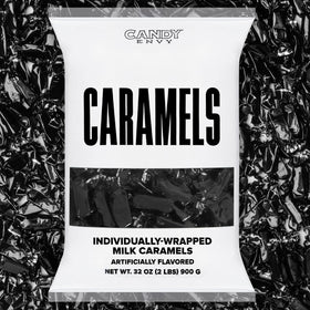 Candy Envy caramels with black wrappers close-up, ideal for gifting and sharing.
