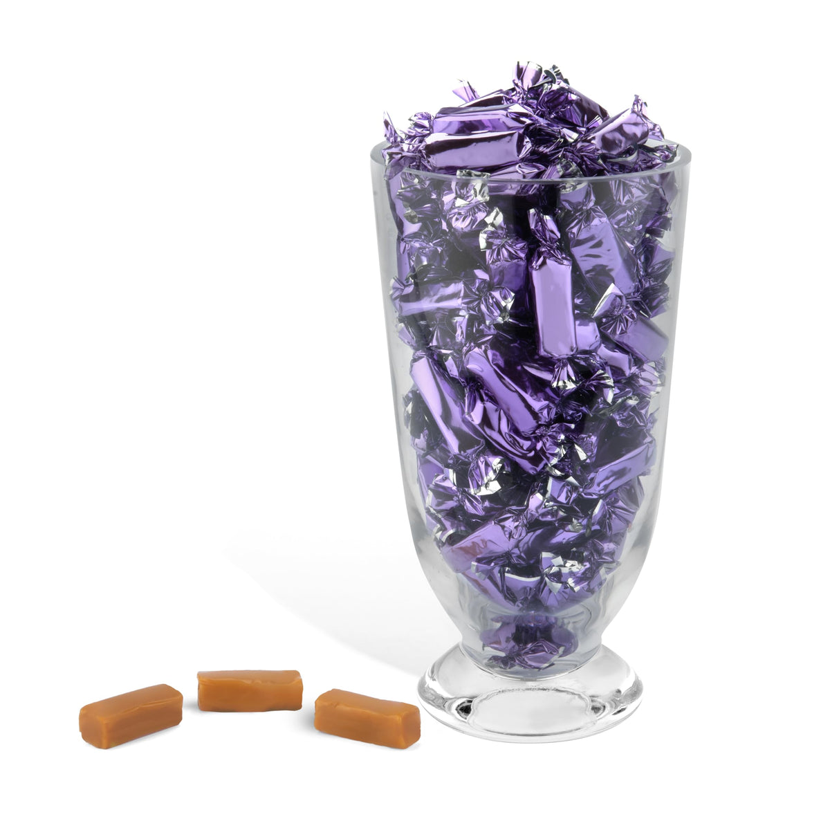 Close-up of purple wrappers enhancing festive appeal around premium caramels.