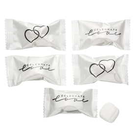 Close-up of Candy Envy Celebrate Love buttermints showing creamy melt and coating.
