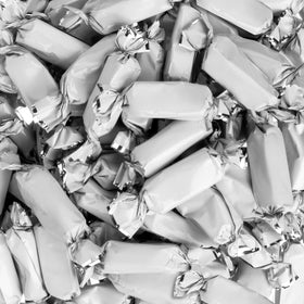 Close-up of soft Candy Envy caramels adjusting to room temperature.