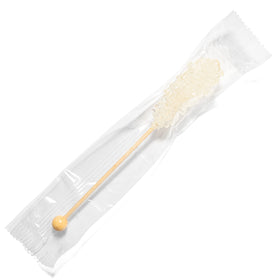 Candy Envy mini rock candy stick in a coffee setup demonstrates quick sweetness.
