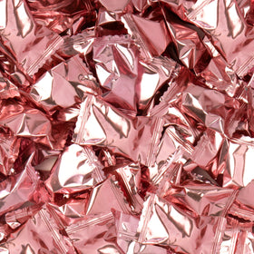 Close-up of Candy Envy Rose Gold Foil Buttermints wrappers.