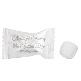 Candy Envy wedding favors displayed on a table with classic mint appeal.