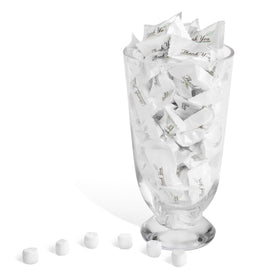Candy Envy buttermints arranged on a wedding reception dish.
