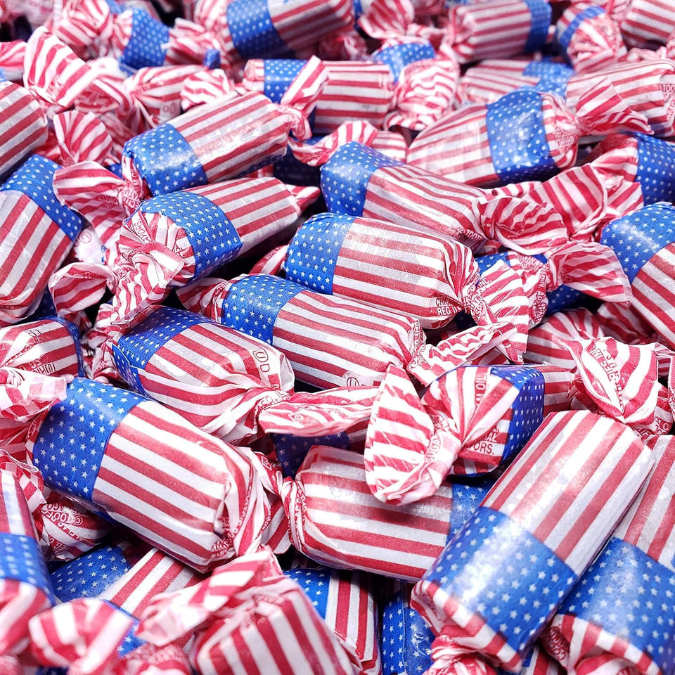 Candy Retailer Flag Tootsie Rolls in patriotic wrappers, ideal for Memorial Day and Fourth of July gatherings.