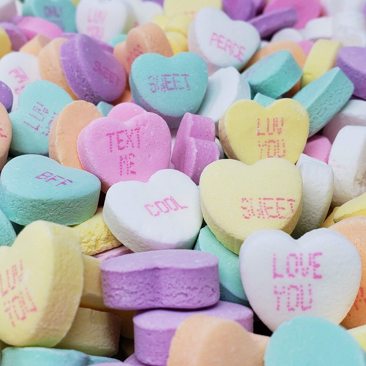 Candy Retailer Valentine’s Day conversation hearts in a 2 lb bag, perfect for sharing.
