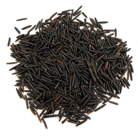 Canoe Wild Rice cooking steam close-up showing fluffy texture and nutty aroma.