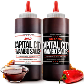 Capital City Mambo Sauce bottle pour — versatile glaze for wings and burgers.