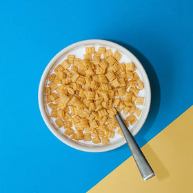 Cap'n Crunch cereal bowl with milk for a crunchy breakfast.