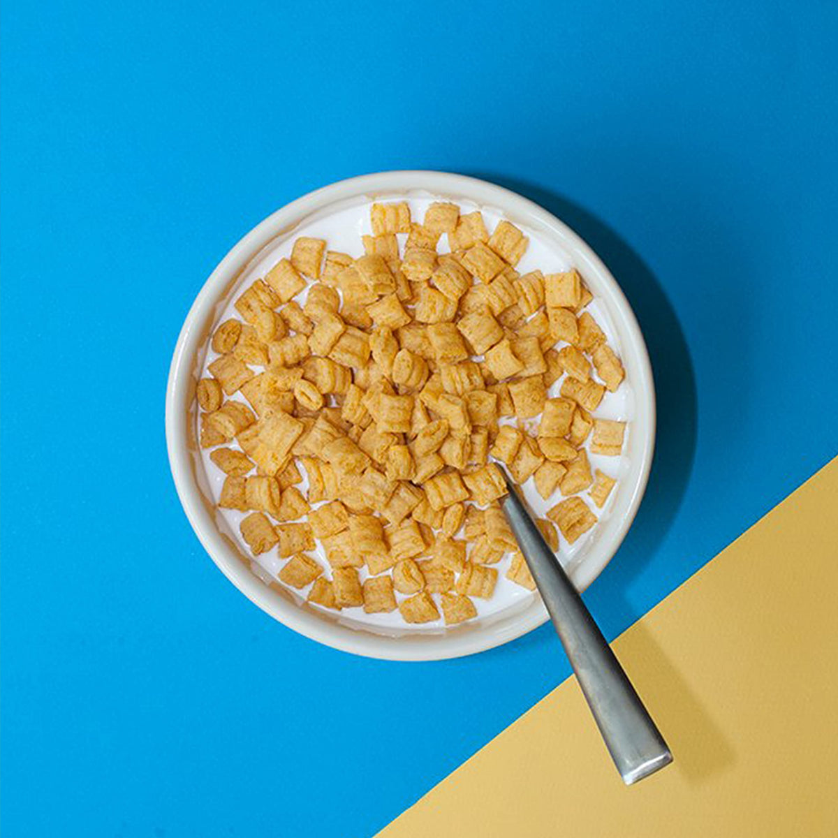 Close-up of Cap'n Crunch Original box art for a bright kitchen display.