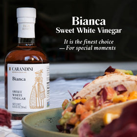 Carandini Bianca Sweet White Vinegar in glass shows versatile finishing touch.