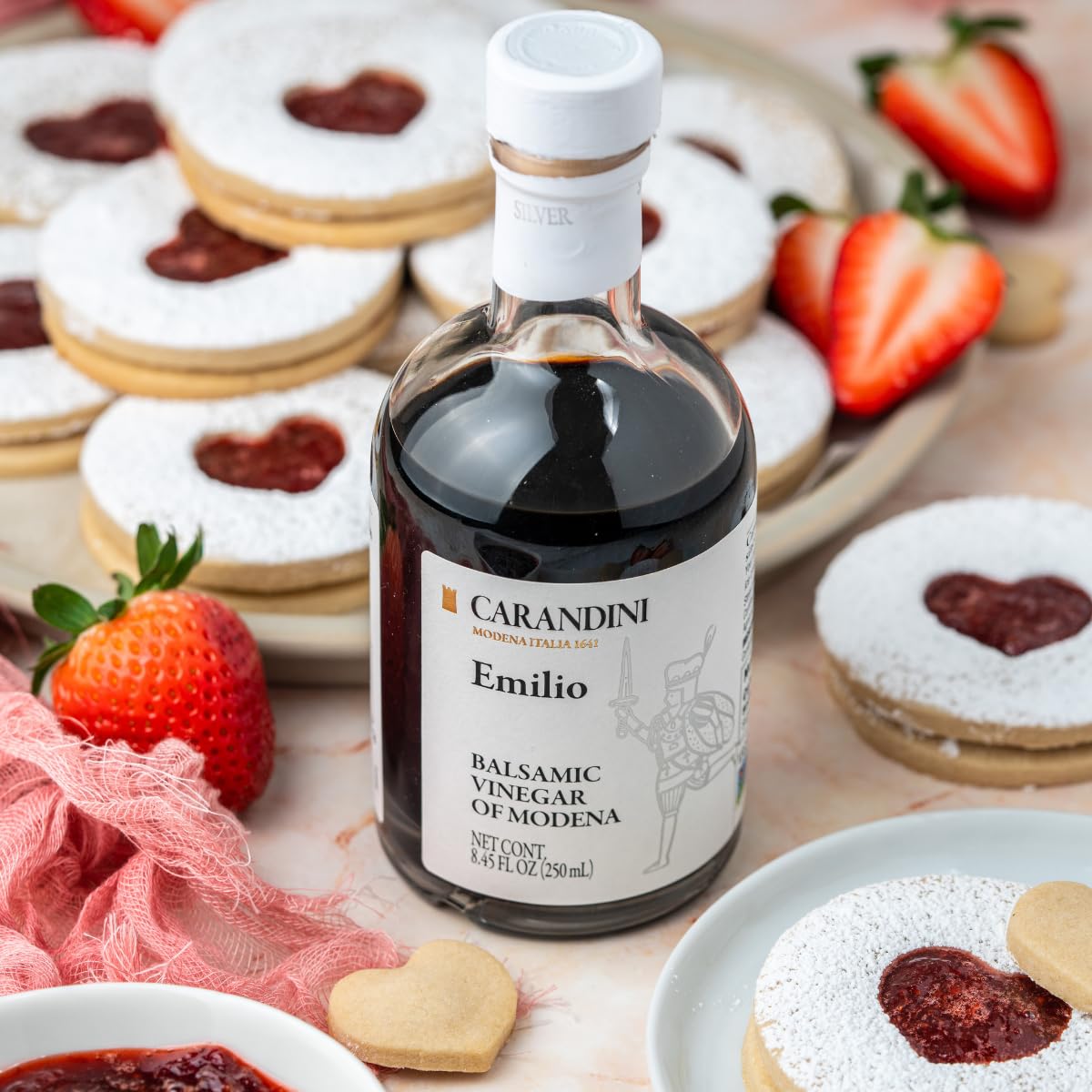 Carandini Emilio Silver balsamic bottle on wood board for premium tasting.