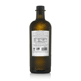 Dark-glass Carapelli EVOO bottle protects flavor and aroma.