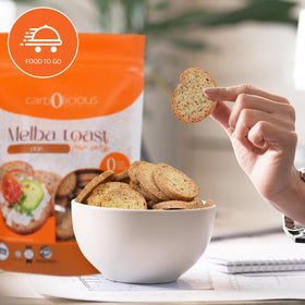 Carb-o-licious low-carb melba toast bag on table, convenient office snack.