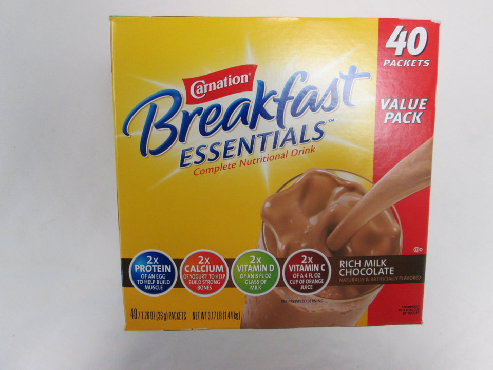 Carnation Breakfast Essentials Rich Milk Chocolate packets ready to mix for a protein-packed breakfast