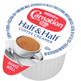 Pantry shelf stocked with Carnation creamer for beverages and desserts.
