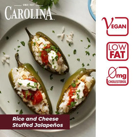 Three 16 oz Carolina Enriched Rice packs stacked for pantry