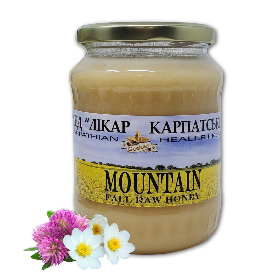 Carpathian Healer raw honey bottle on wood, ready to enjoy with tea