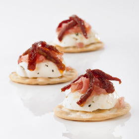 Close-up view of Carr's crackers texture—crisp, delicate baked goodness.