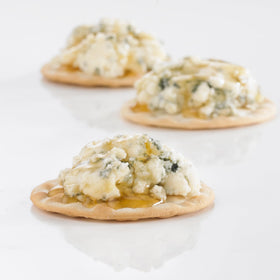 Carr's Royal Portion Water crackers in a bread basket add light, crisp texture.