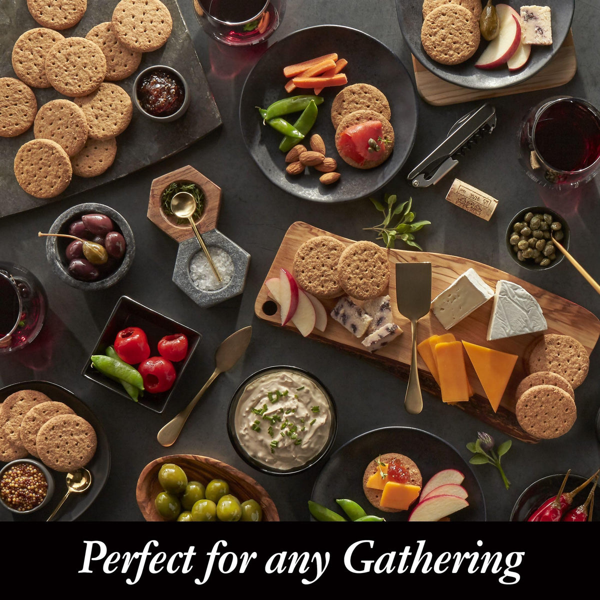 Serving plate with Carr's crackers and cheeses, perfect for entertaining.