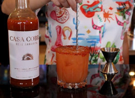 Casa Cobre Real Sangrita serving glass evokes festive, smoky aroma.