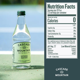 Cascade Mountain glass bottle being poured, highlighting clean pour and refreshing taste
