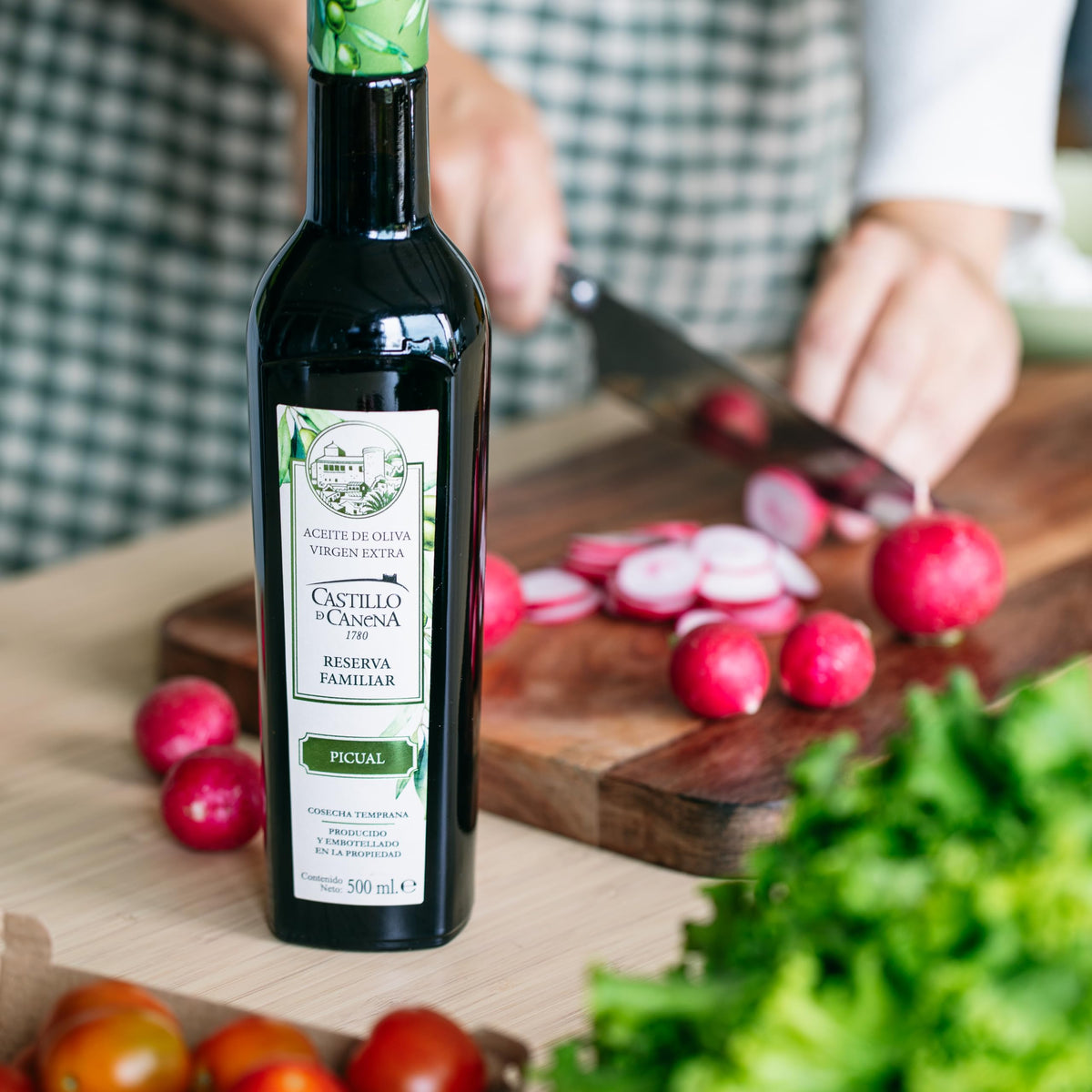 Close-up of Castillo de Canena Picual olive oil label showcasing heritage and craftsmanship.