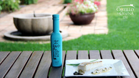 Castillo de Canena label and bottle, showcasing award winning smoked EVOO origin.