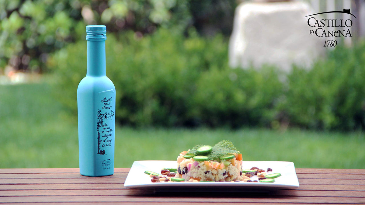 Pour shot of Castillo de Canena smoked Arbequina EVOO, silky amber drizzle.
