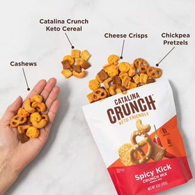Catalina Crunch Spicy Kick Mix ingredients close-up: keto cereal, pretzels, cashews.