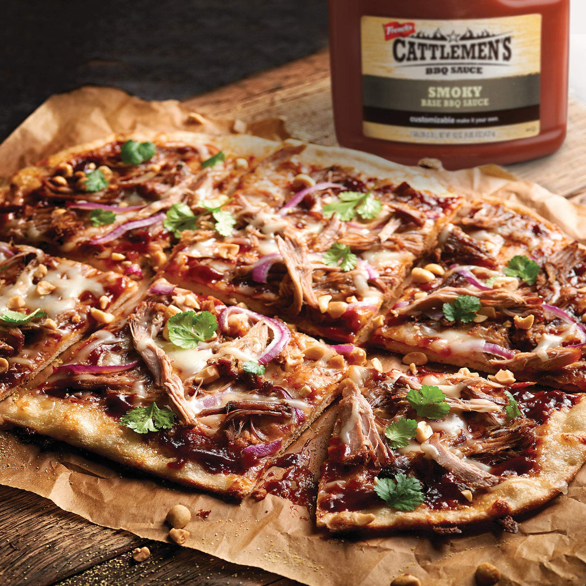 Cattlemen's Smoky Base BBQ Sauce ribs prep image demonstrates versatile base for rib glazes.