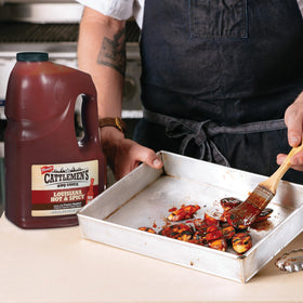 Cattlemen's Louisiana hot sauce pairs with Cajun sausages and beer onions