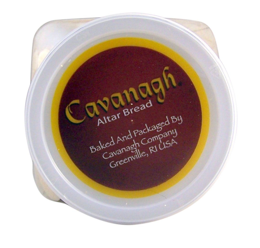 Cavanagh Altar Bread wafers at the humidification stage, cut into circles.