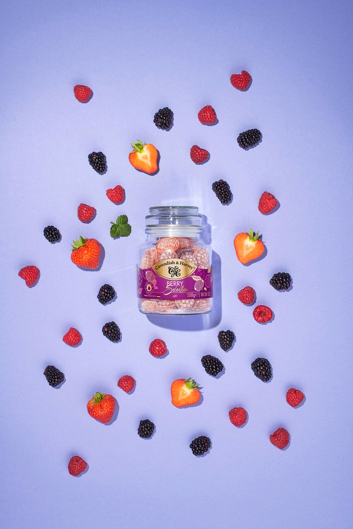 Close-up of Cavendish & Harvey berry drops, vivid real fruit juice flavors.