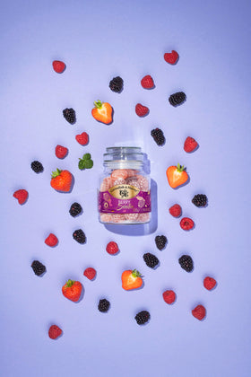 Close-up of Cavendish & Harvey berry drops, vivid real fruit juice flavors.