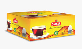 Brewing Altin Suzen tea in a cup reveals a rich ruby infusion.
