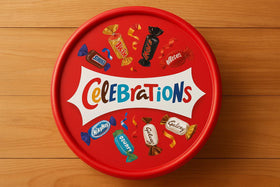 Celebrations chocolate tub opened to reveal assortment for party snacking