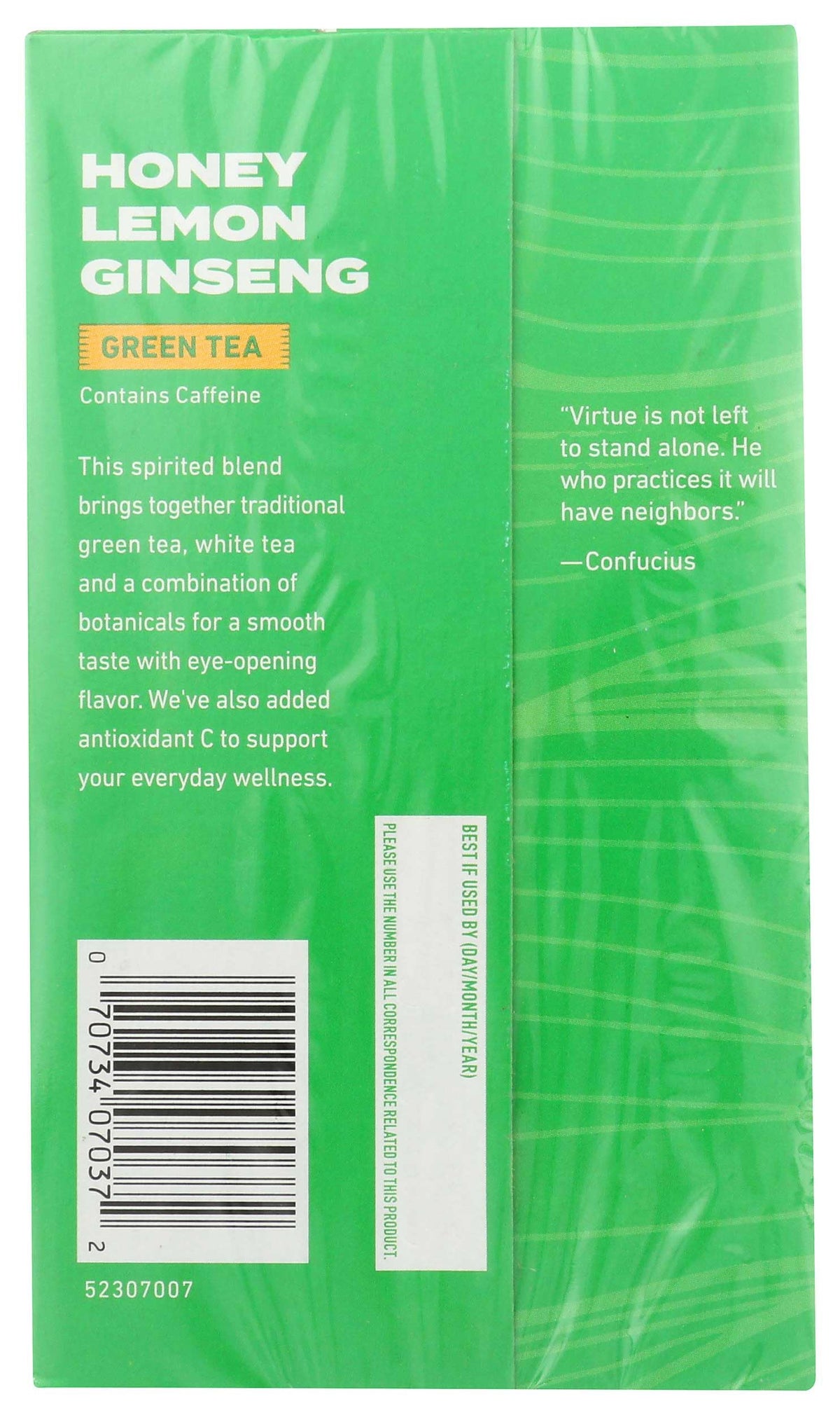 Close-up of Celestial Seasonings tea bags with honey lemon ginseng and fresh aroma.