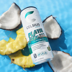 CELSIUS Playa Vibe can on ice signaling a refreshing pick-me-up.