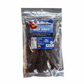 Centennial Cuts Cowboy Style packaging highlights rugged branding and clean ingredients for on-the-go snacking.