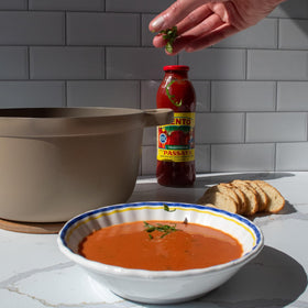 Ready-to-use Cento Passata base for easy, flavorful pizza sauces.