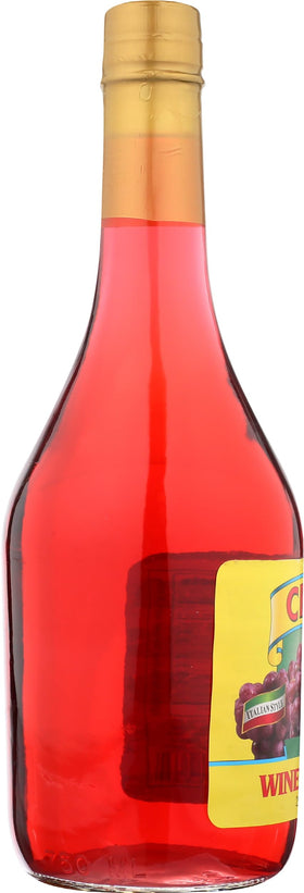 Cento Red Wine Vinegar bottle near spices, ideal for marinades.