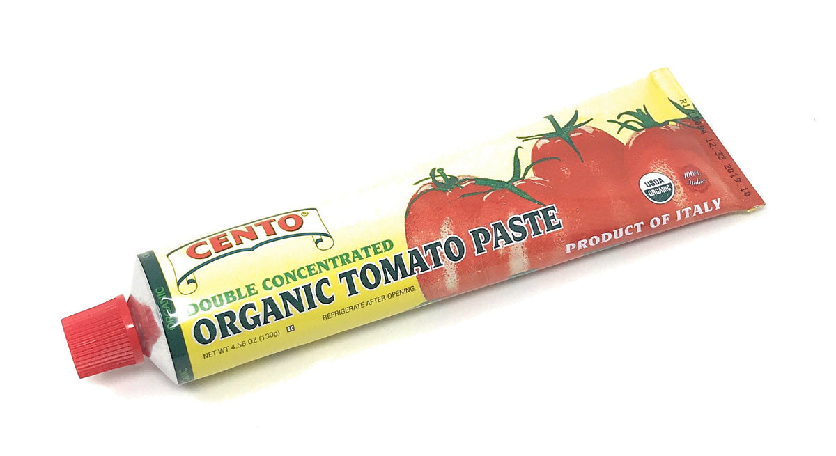 Cento tomato paste tubes on a clean counter suggesting easy meal prep