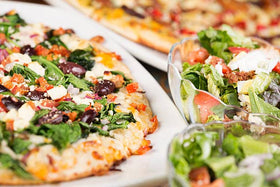 Central Grocery Olive Salad as pizza topping for zesty, olive-forward finish.