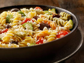 Central Grocery Olive Salad enhances seafood dishes with bright olive notes.