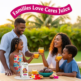 Ceres juice in a glass with ice, showcasing a bright tropical color.