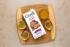 Ceres Passion Fruit Juice packaging display, emphasizes kosher and preservative-free promise