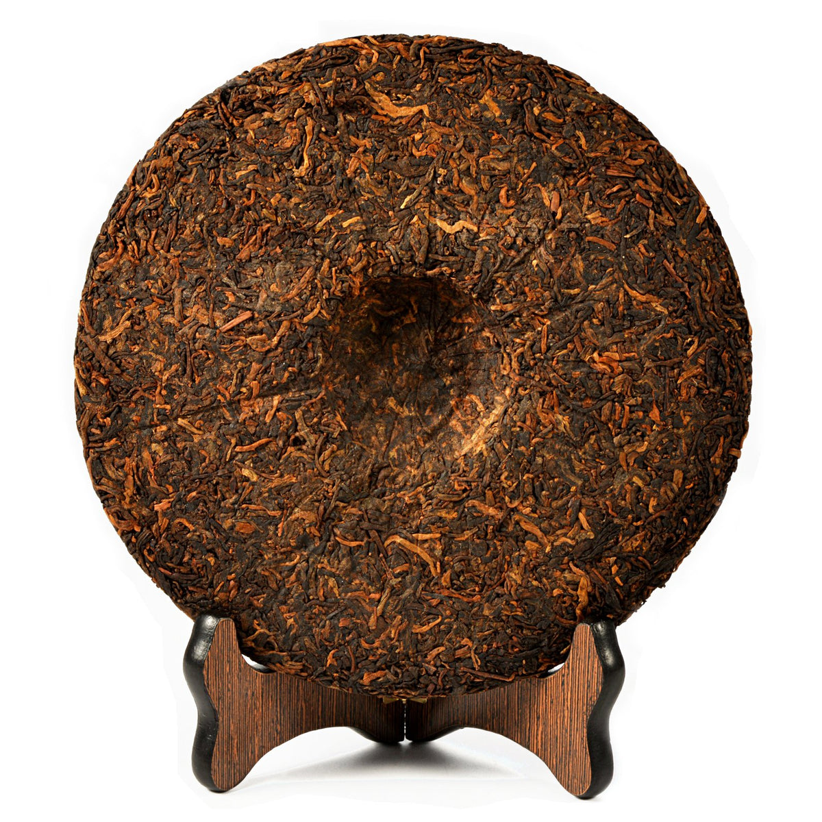 ChaWuWarmSun JinYaGongTing tea cake in hot water cup, mellow comfort after meals.